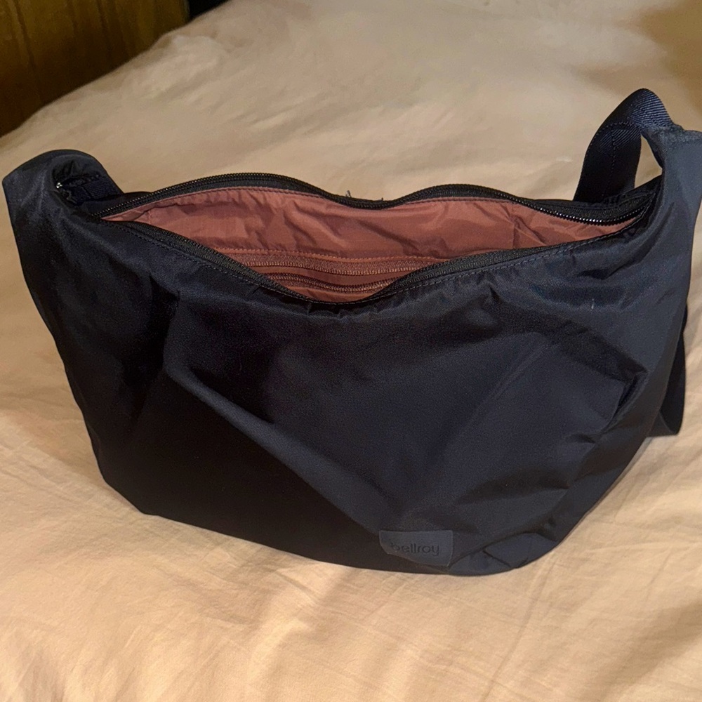 Bellroy Black Laneway Crescent Bag with Orange Tag